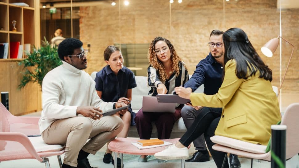 Young workers being productive in an office meeting