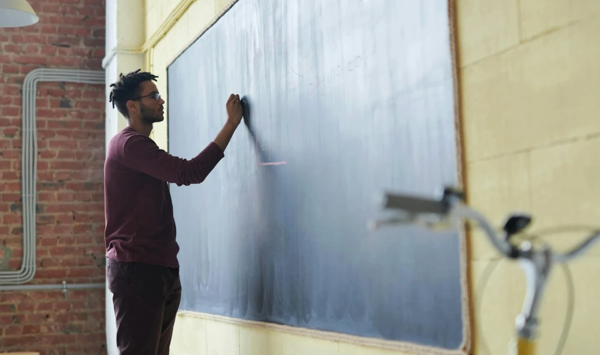 teacher writing on board